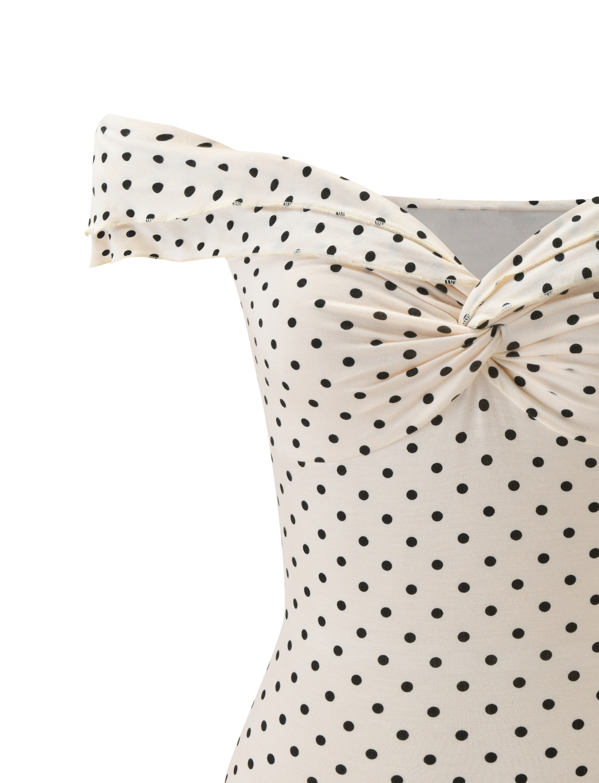 Close-up of the TIGERMIST DENALI TOP - CREAM DOT, an off-shoulder cream top with black polka dots and a twisted knot neckline. Only the upper part is shown.