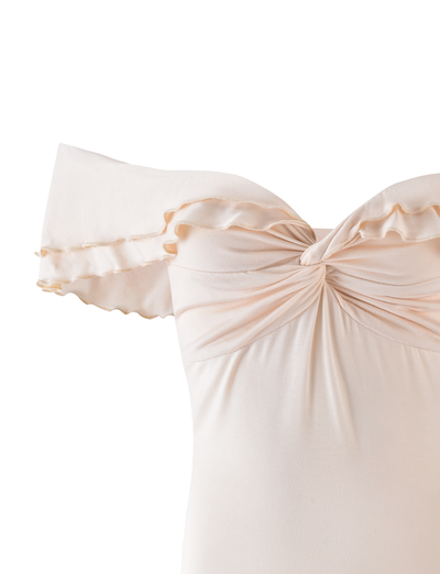 A close-up of the TIGERMIST DENALI TOP in Neutral: Bone, featuring ruffled off-shoulder sleeves and a twisted knot sweetheart neckline, displayed against a white background.