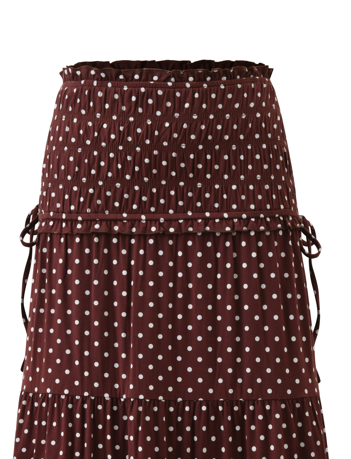 A close-up of the TIGERMIST DENALI MAXI SKIRT - BROWN DOT, featuring polka dots, a smocked waistband, ruffled tiers, and adjustable side waist ties for a perfect fit.