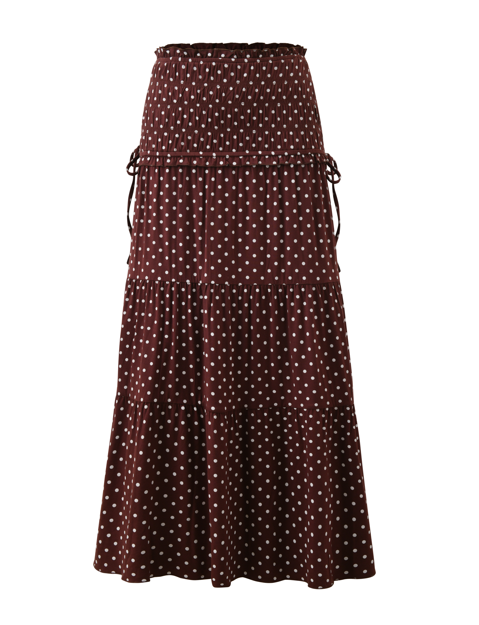 The DENALI MAXI SKIRT - BROWN DOT by TIGERMIST features a high smocked waist, tiered ruffles, adjustable side ties, and a flowy silhouette for effortless style.