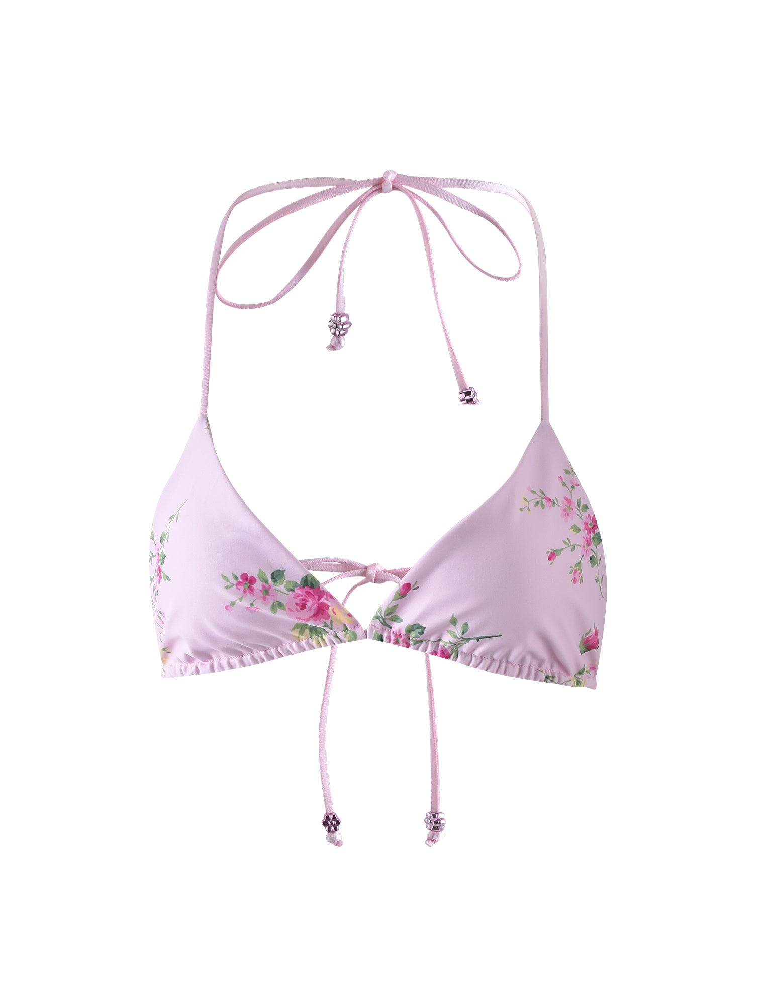 The AVE BIKINI TOP - PINK : MACRO FLORAL by TIGERMIST is a light pink bikini top adorned with a floral pattern featuring small, delicate pink and green flowers. It has a halter neck tie and a lace-up detail on the front, complete with beads at the end of the strings.