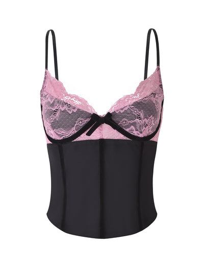 The MORENA TOP - BLACK/PINK by TIGERMIST is an elegant and form-fitting women's bustier featuring thin shoulder straps, a pink lace overlay on the upper part, and a small black bow in the center.