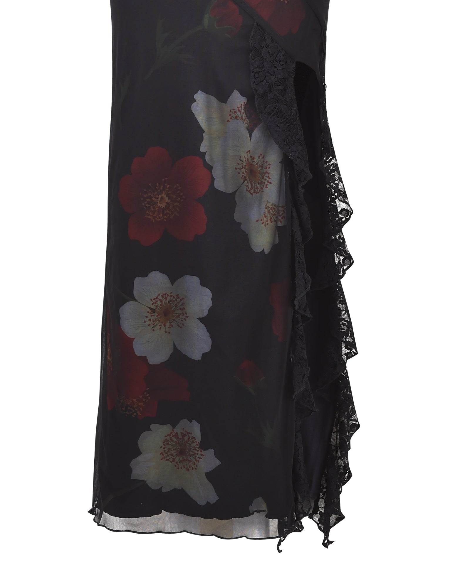 A close-up of the TIGERMIST THEO MAXI DRESS - RED: MACRO FLORAL showcasing dark fabric adorned with large red, white, and yellow floral patterns. The edge of the dress features an ornate black lace trim that cascades downwards in ruffled layers.