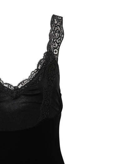 A close-up of the Kacie Dress - Black by Tigermist featuring intricate lace detailing. The lace adorns the neckline and straps, adding an elegant touch to the design. Set against a plain white background, this highlights both the intricacies of the lace and the sleekness of the dress.