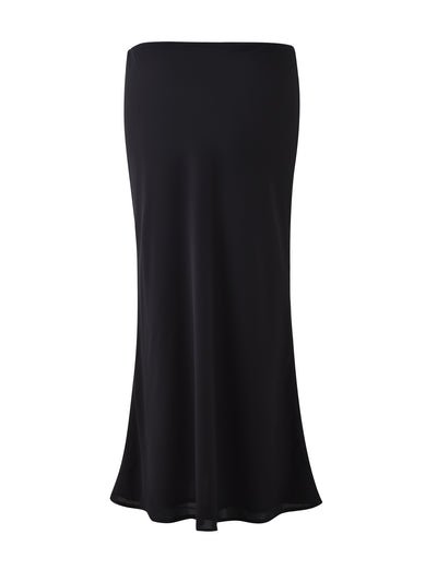 The MOIRA SKIRT - BLACK from TIGERMIST is showcased against a plain white background. This long, straight skirt features smooth, flowing fabric and a minimalist design without any visible patterns or embellishments.