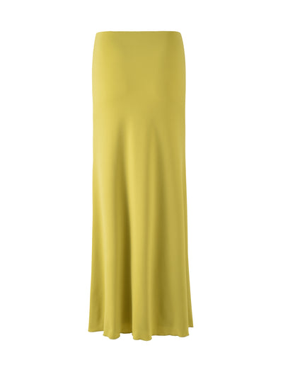 A long, ankle-length maxi skirt in a bright chartreuse fabric by TIGERMIST is displayed against a plain white background. The MIST SKIRT - GREEN features a smooth and flowy texture with a simple, streamlined design.