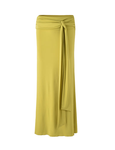 A long, olive green Tiger Mist skirt with a high waist and a front knot-tie detail at the top. The fabric appears to be flowy and smooth, extending straight down to ankle length.