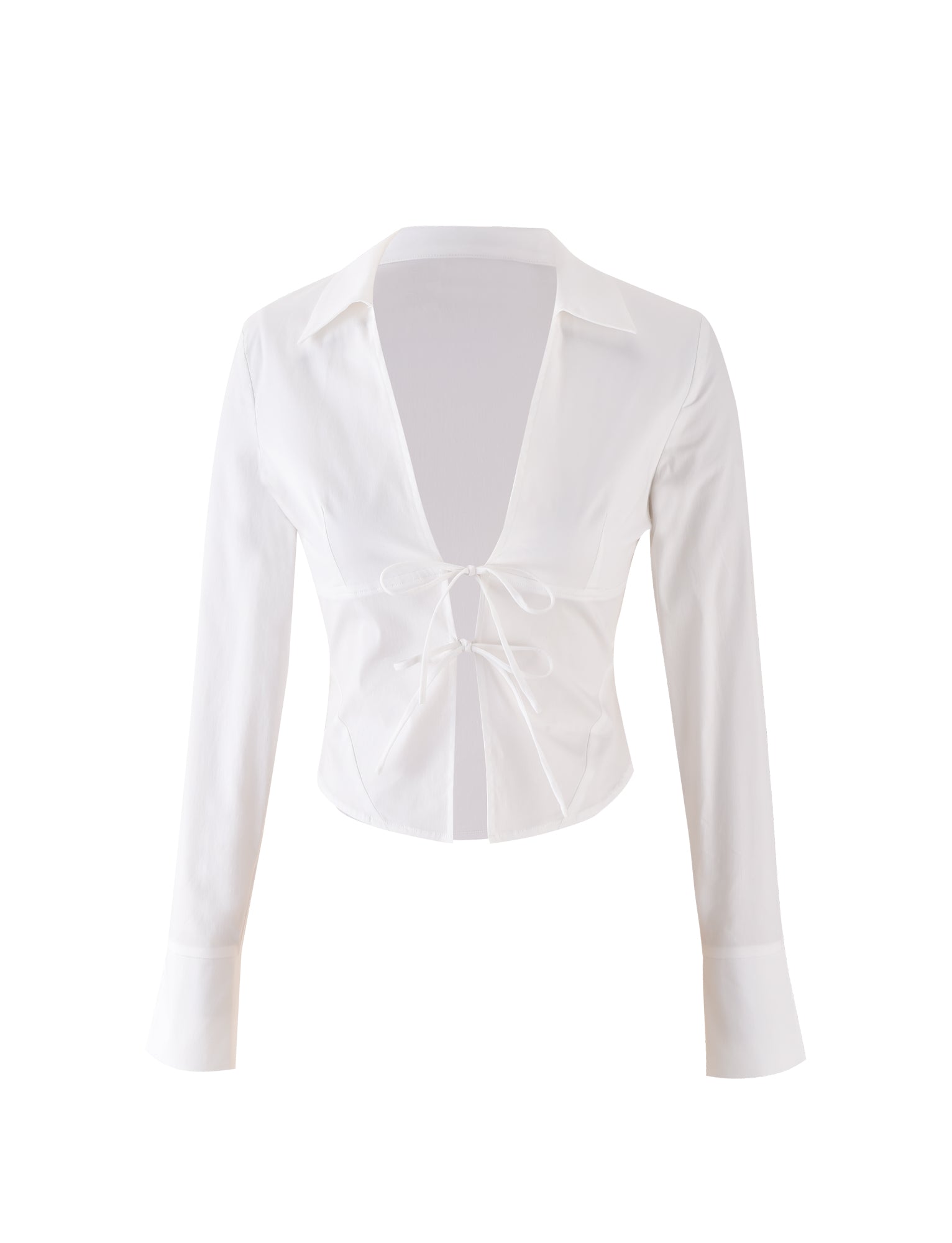 The ELVA SHIRT - WHITE from TIGERMIST is a stylish long-sleeve crop top featuring a deep V-neckline and chic tie-front closure. With its collar and cuffs, it exudes a semi-formal vibe, while the lightweight and slightly sheer fabric enhances its elegant appeal.