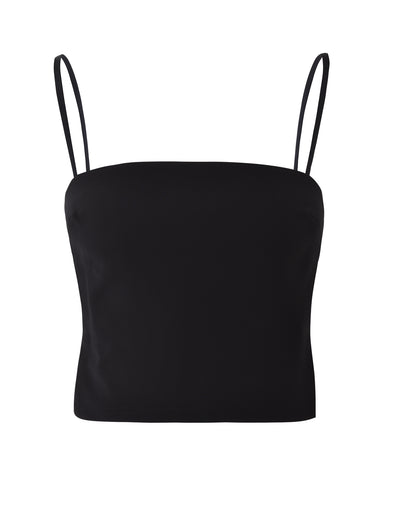 Introducing the NAYSHA TOP - BLACK from TIGERMIST, a black sleeveless crop top with spaghetti straps and a straight neckline, showcasing a simple and minimalist design. The fabric is smooth and fitted, offering a sleek appearance. The product is displayed against a plain white background.
