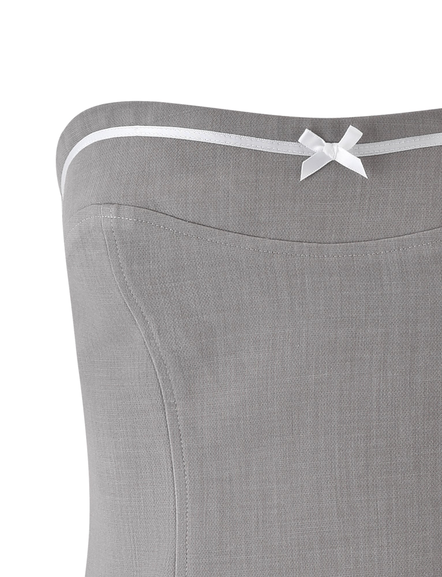 Close-up of a LENINA TOP in light grey by TIGERMIST, showcasing a smooth fabric texture. The top is adorned with a white ribbon trim along the neckline, highlighted by a delicate white bow at the center. The simple yet elegant design reflects TIGERMIST's signature style.