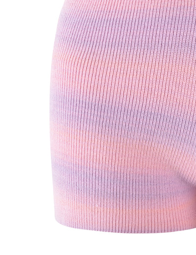 Close-up of the YARRA SHORT from TIGERMIST, showcasing a gentle gradient of pastel colors, including shades of pink, purple, and blue. The knit fabric appears soft and has a ribbed texture, suggesting it could be part of a fashionable garment.