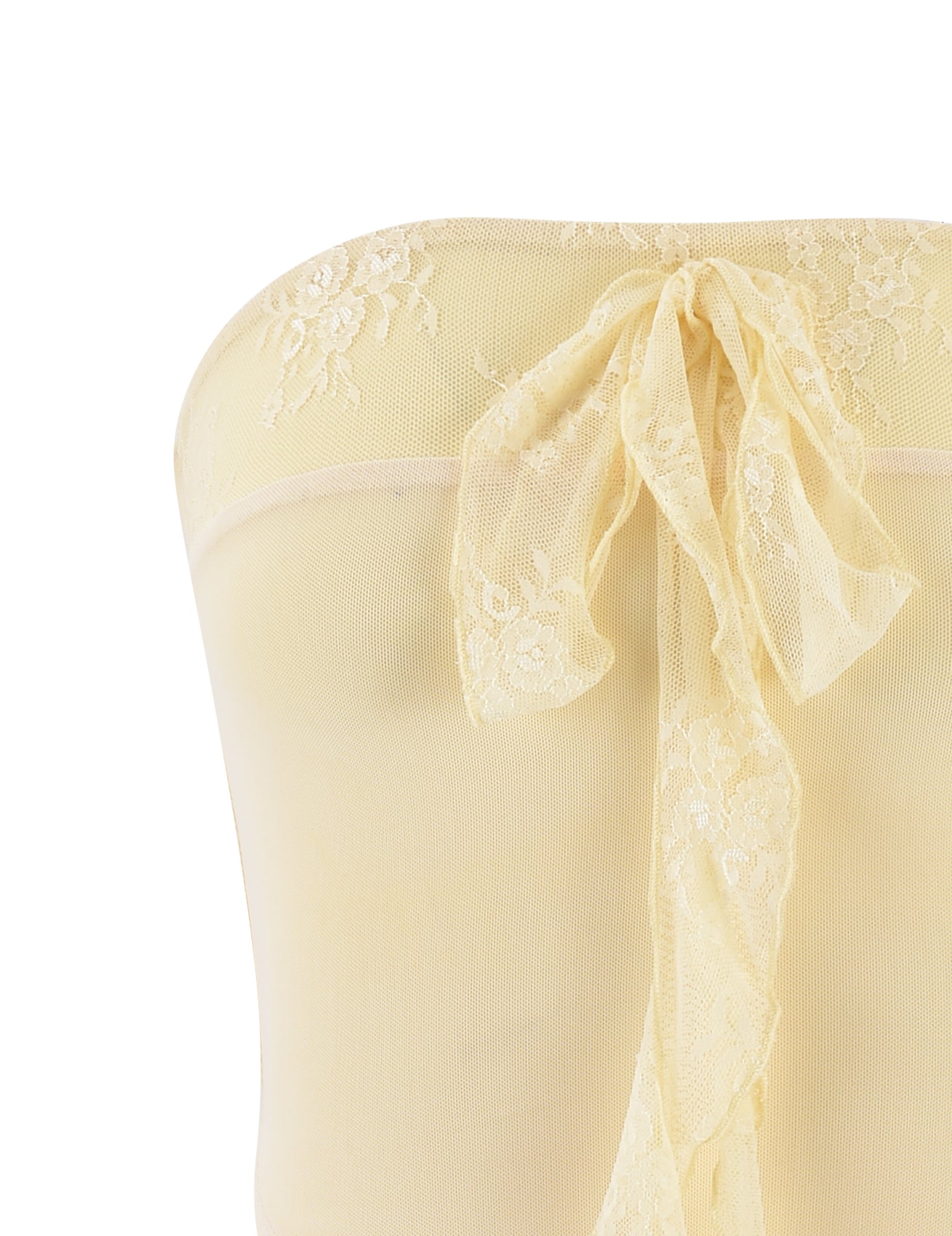 Image of the HARPER TOP - YELLOW : LEMON by TIGERMIST featuring an intricate lace bow detail at the back. The light yellow, strapless top is accented with delicate floral lace patterns.