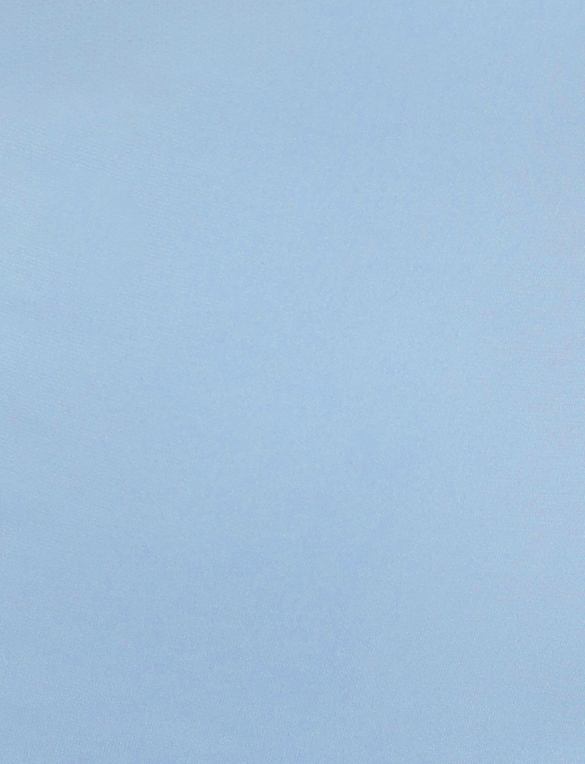 A plain, solid baby blue background with a smooth finish, inspired by the serene hue of TIGERMIST’s ZITA DRESS - BLUE : BABY BLUE.
