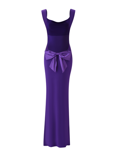 The TIGERMIST ZITA MAXI DRESS - PURPLE is a long, deep purple bodycon dress featuring a large decorative waist bow, shown on a white background.