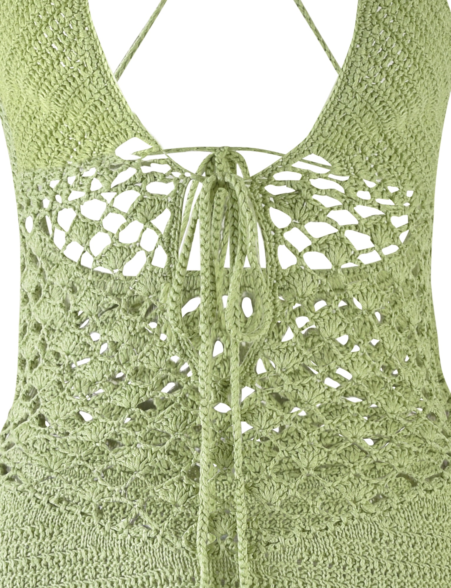 Close-up of the pastel green ISABELL DRESS from TIGERMIST, showcasing intricate crochet patterns. The design features a deep neckline and a tie closure in the middle, with the delicate crochet pattern creating a semi-transparent effect.