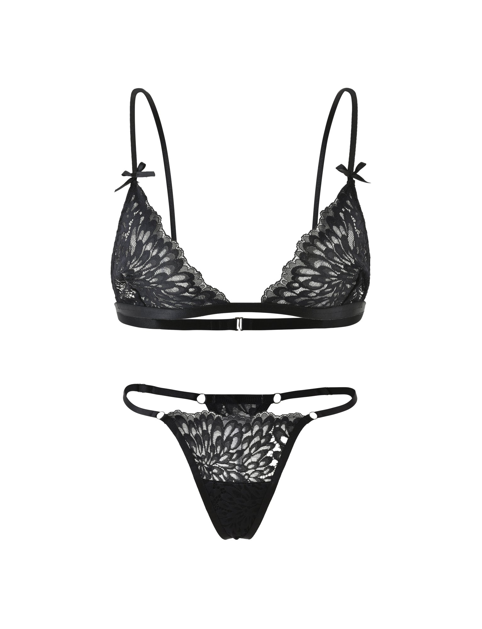 Introducing the BROOKE SET - BLACK by TIGERMIST, a stunning black lace lingerie ensemble. This set includes a bralette with adjustable straps and delicate sheer floral lace detail, adorned with small bow accents at the straps. The matching thong features the same elegant sheer lace pattern with thin elastic sides, exuding both elegance and allure.