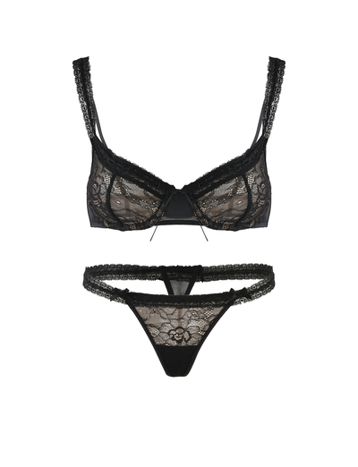The TIGERMIST PANDORA SET - BLACK is a lace lingerie set with an adjustable bra, thin straps, and matching panties, both decorated with floral lace patterns and bow accents.
