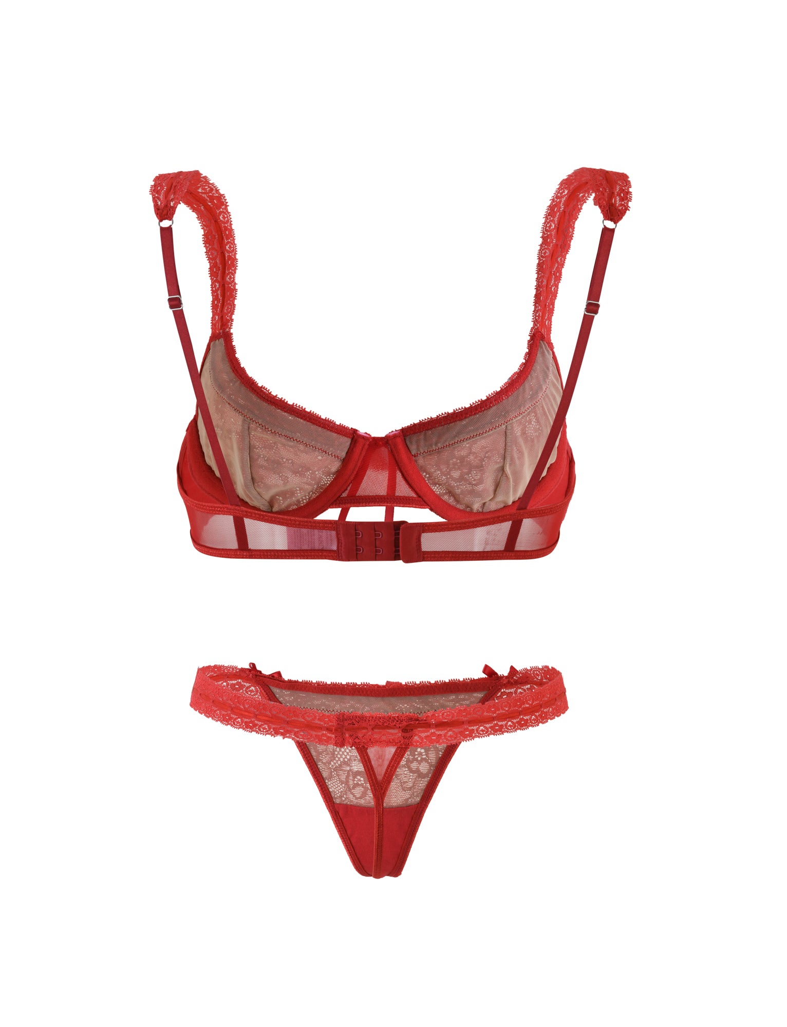 The PANDORA SET in Salsa by TIGERMIST features a stunning red lingerie ensemble, including a lacy bra with adjustable straps and hook closure. Paired with a matching lace-trimmed thong, the set showcases intricate embroidery and sheer fabric for an elegant and delicate touch.