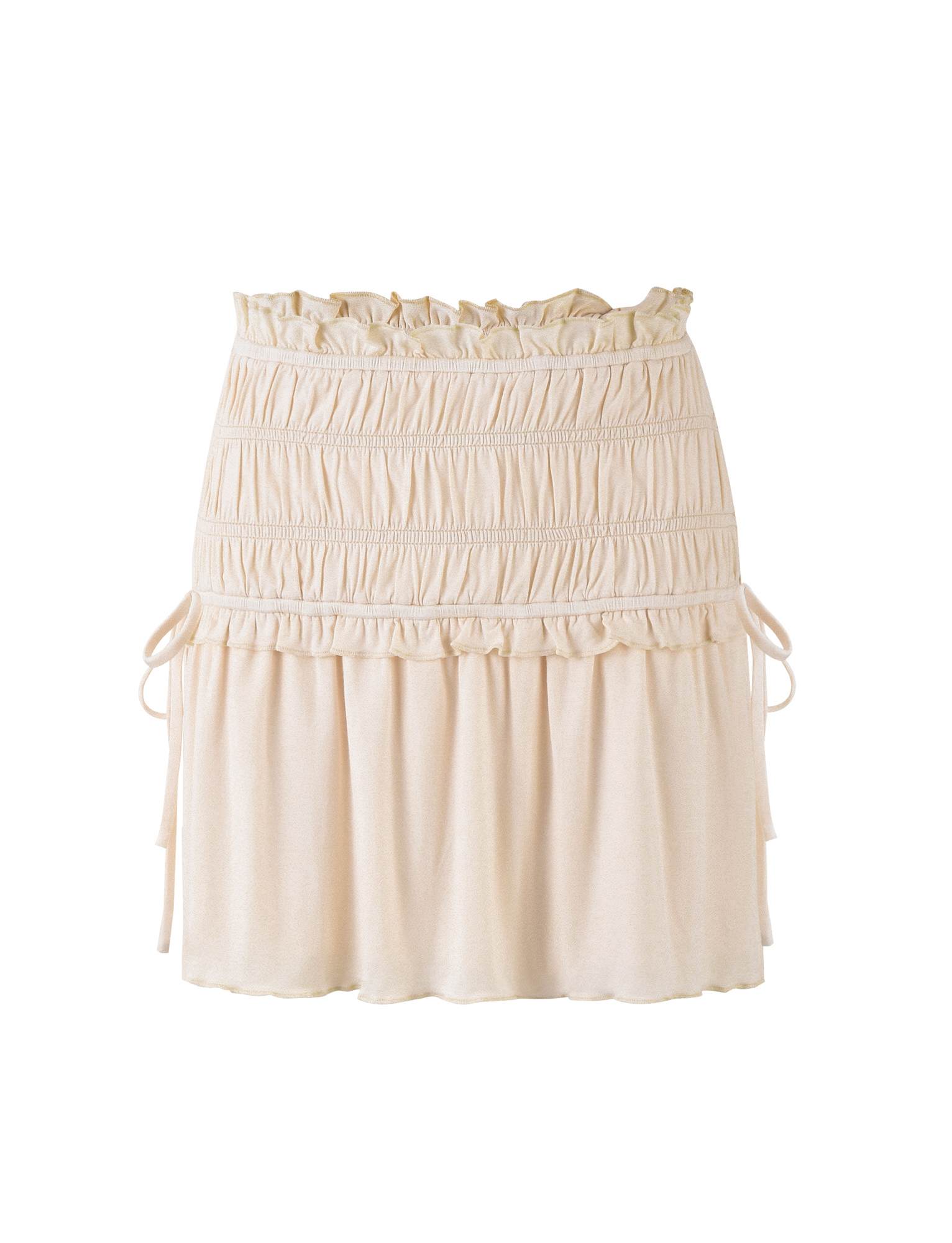The TIGERMIST DENALI MINI SKIRT - WHITE : BONE features a mid-rise waist, ruffled waistband, gathered details, and side ties. Made from buttery jersey fabric, its flared silhouette offers a soft, flowy look against a crisp white background.