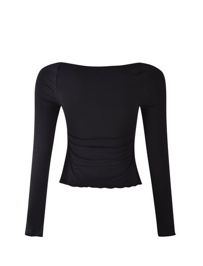 A black, long-sleeve, off-shoulder top named the "KAROLINA JERSEY LONG SLEEVE TOP" by TIGERMIST displayed on a white background. The top features form-fitting fabric with slight ruching on the sides and a subtle ruffle at the bottom hem.