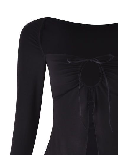 A close-up of the KAROLINA Jersey Long Sleeve Top in black by TIGERMIST shows the upper half, focusing on the neckline and chest area. The top features a round neckline with a small, central keyhole cutout adorned with a delicate bow tie. The fabric appears smooth and slightly stretchy.