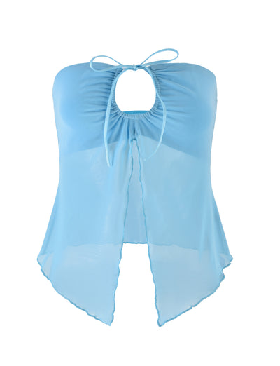 The KAROLINA MESH TOP by TIGERMIST in a light blue, sheer design features a strapless cut with a halter neck tie. The fabric gathers at the bust and flows loosely below, showcasing a front slit and an asymmetrical hemline. The lightweight, translucent material enhances its airy feel.