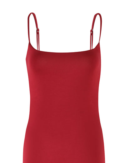 A form-fitting MINERVA MAXI DRESS - RED in Berry Red from TIGERMIST featuring thin, adjustable shoulder straps. The top of this bodycon maxi dress showcases a straight neckline and smooth texture, set against a white background.