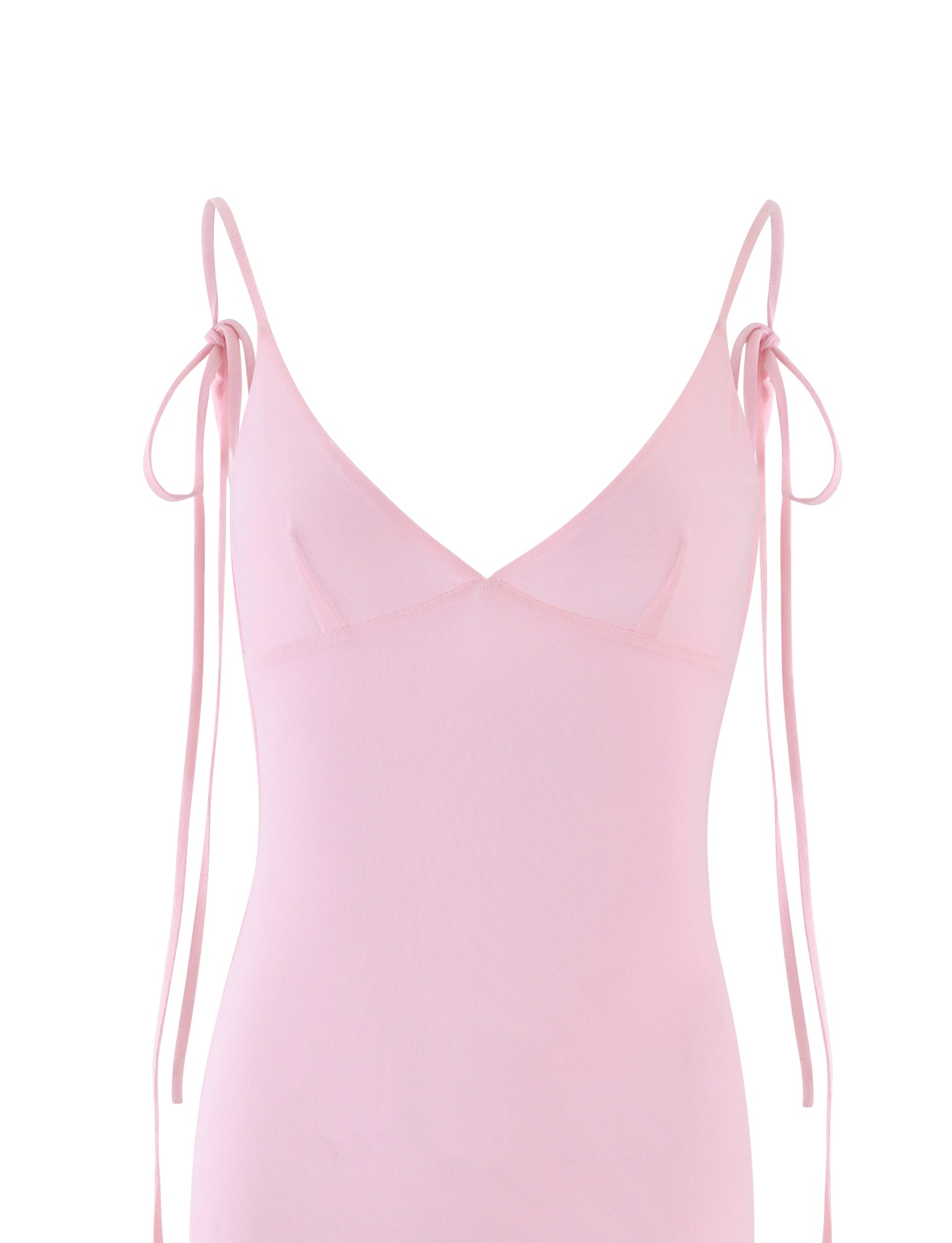 A light pink, sleeveless KYLAH DRESS - PINK: BABY PINK from TIGERMIST features thin shoulder straps that tie into bows. With a minimalist design and deep V-neckline, the fabric appears soft and delicate against the plain white background.