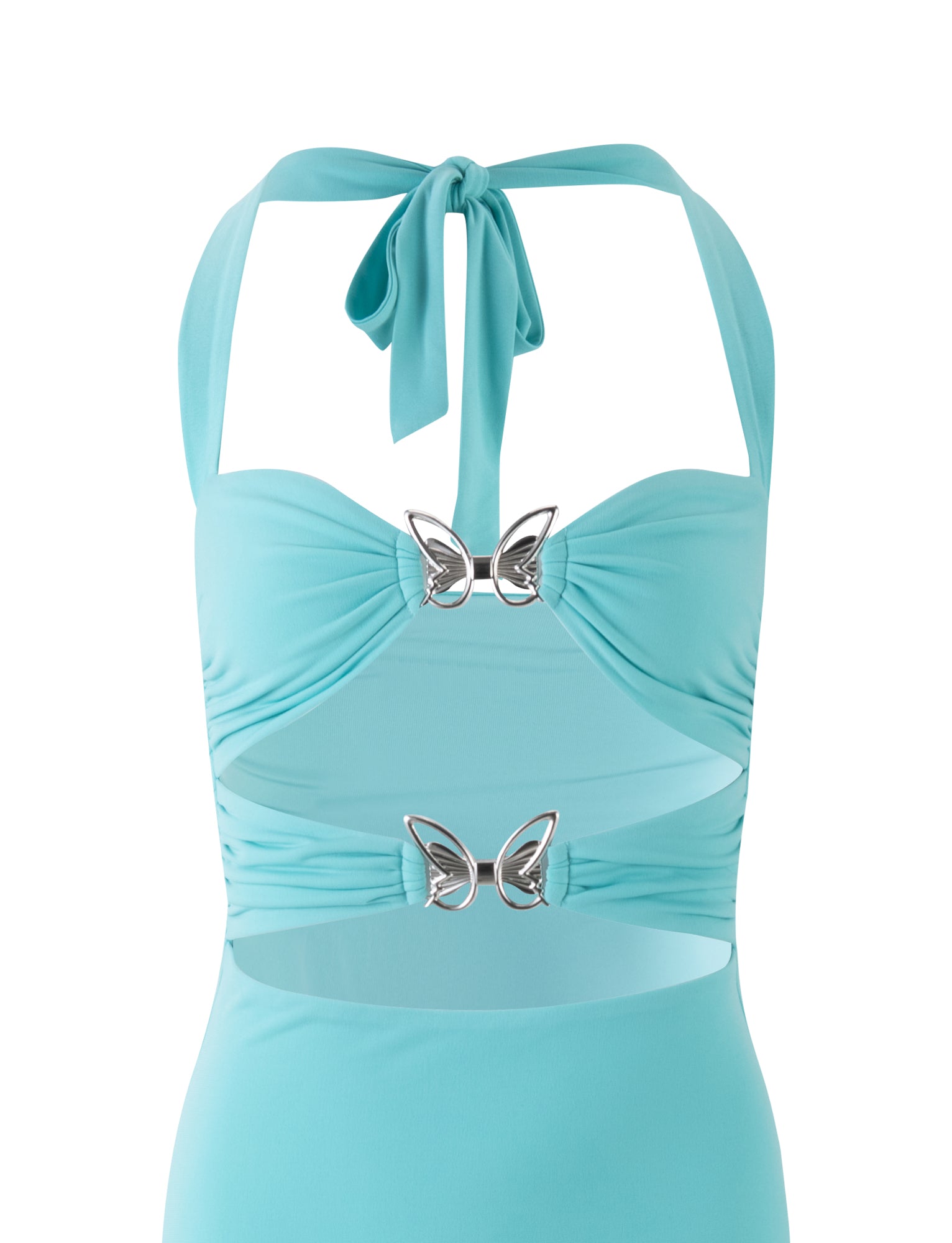 A baby blue halterneck swimsuit from TIGERMIST featuring two butterfly-shaped metallic embellishments in the front. The swimsuit, known as the CORALINE DRESS - BLUE : BABY BLUE, has cutout details around the waist area and a tie fastening at the neck.