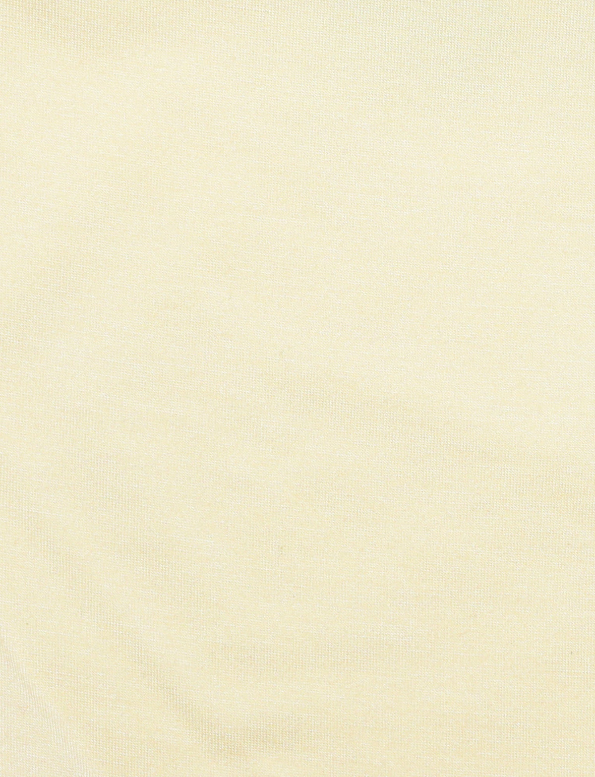 A close-up of the DARIAN TOP - YELLOW : BUTTER from TIGERMIST. The fabric's light yellow hue and soft texture, with subtle variations in the weave pattern, evoke qualities of a high-stretch material perfect for a strapless design. This warm and gentle color is ideal for creating flattering bodycon silhouettes.