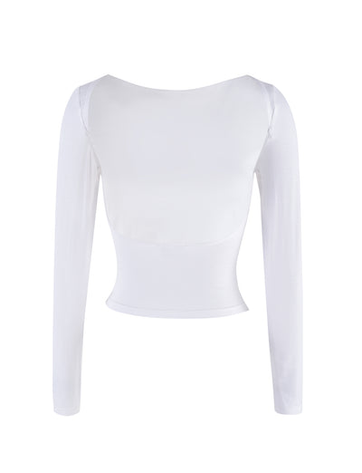 Introducing the QUINNELL TOP - WHITE by TIGERMIST, a white long-sleeve crop top with a fitted design featuring a slightly scooped back neckline. The fabric is smooth and stretchy, ensuring both comfort and style.