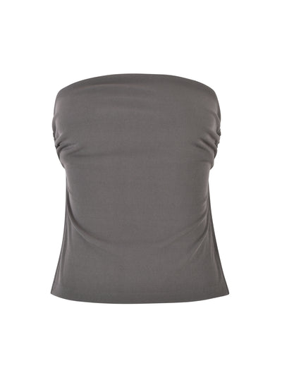The SONATA TOP - GREY: CHARCOAL from TIGERMIST is displayed against a white background. The dark grey, strapless tube top has a smooth and form-fitting fabric with slight ruching on the sides, creating a snug fit around the bust.
