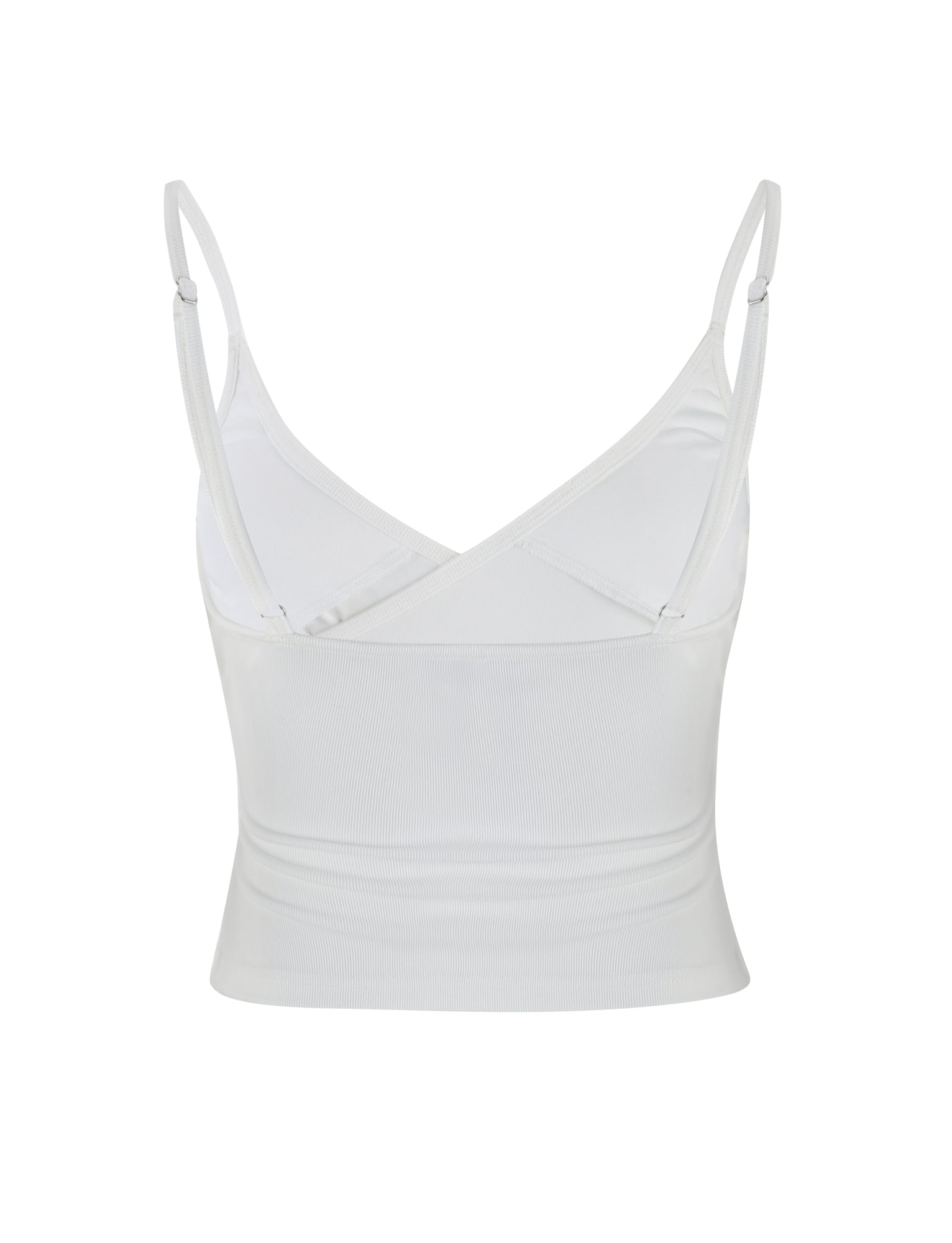 An image of the REY TOP - WHITE by TIGERMIST, a sleeveless crop top featuring adjustable spaghetti straps and a V-neck design. The top has a fitted look and is made from lightweight fabric, with a V-shaped back that offers a simple and clean style.