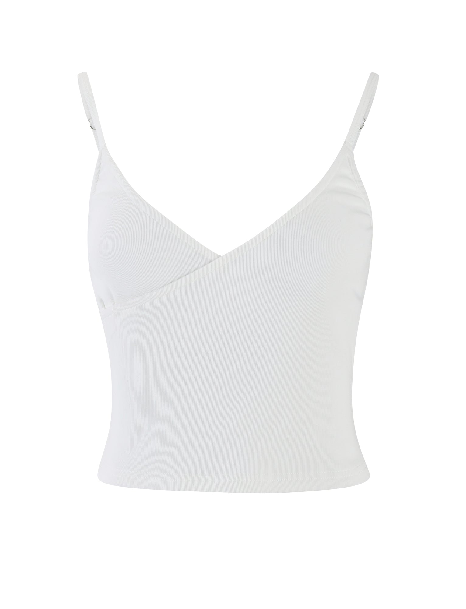 A white REY TOP from TIGERMIST featuring thin adjustable straps and a wrapped V-neckline design. This sleeveless tank top is plain and unadorned, creating a clean and simple look. The fabric appears to be lightweight and slightly stretchy.
