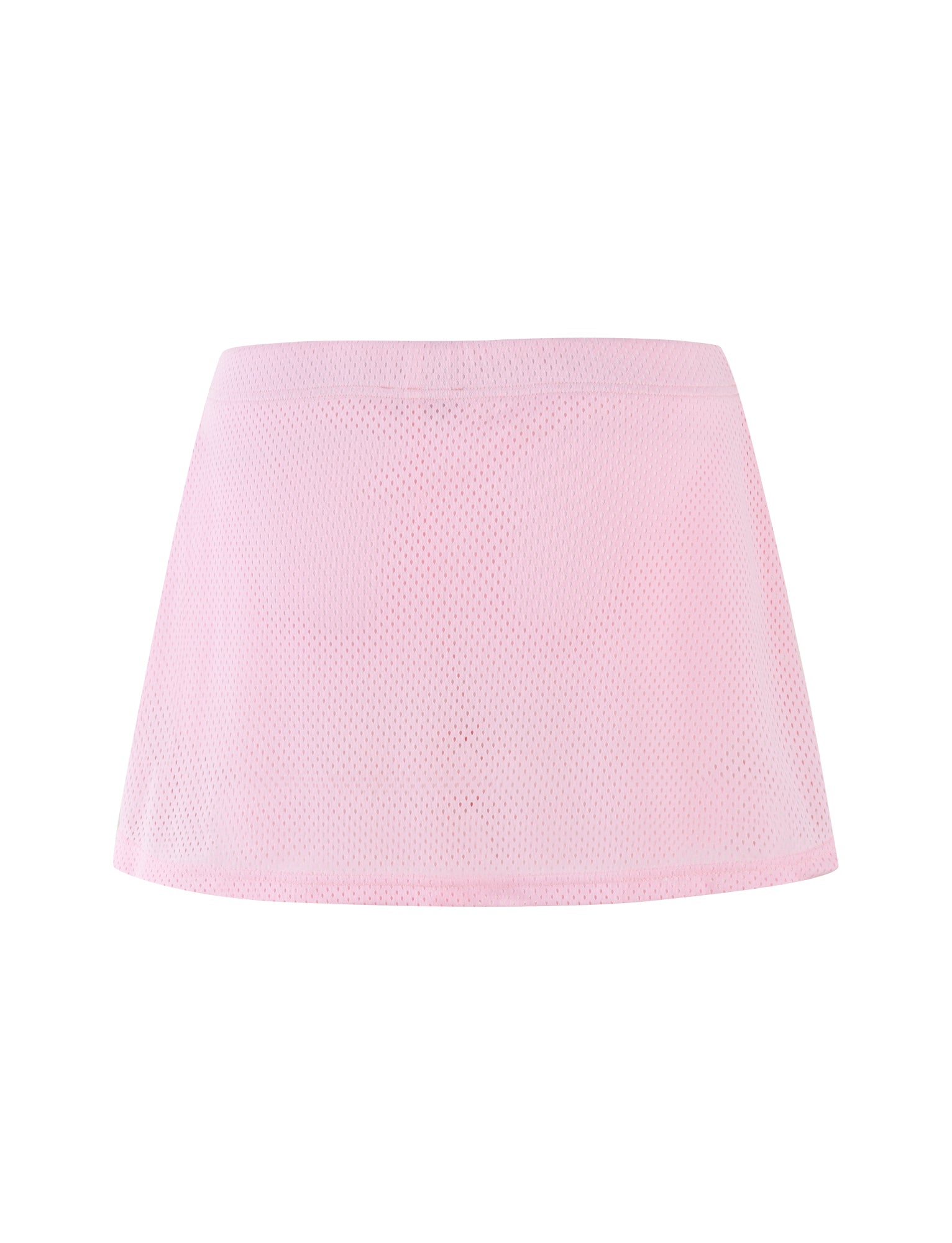 The NYDIA SKORT in blush pink from TIGERMIST features a light pink, slightly flared mini skirt design with mesh fabric. It has a seamless waistband and semi-transparent material, adding a delicate texture to its overall look.
