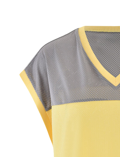 Close-up of the ZENITH TANK - YELLOW : PALE YELLOW from TIGERMIST, showcasing a combination of pale yellow and gray mesh materials. The neckline is V-shaped, with yellow trim along the collar and sleeves. The top half is gray, while the bottom half is pale yellow, both featuring a breathable mesh design.