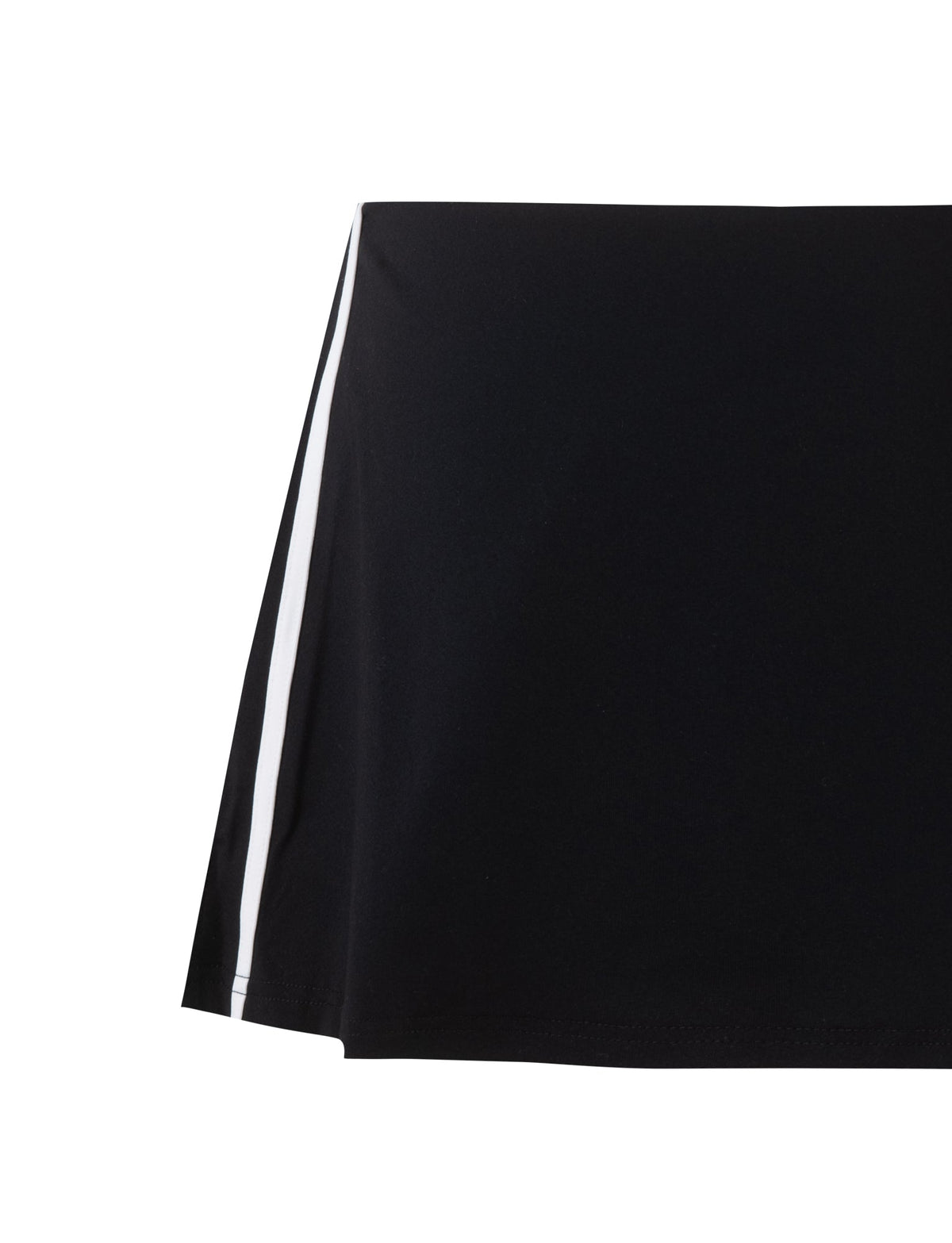 A close-up of the ELESSAR SKORT - BLACK by TIGERMIST reveals a smooth, high-quality fabric featuring a clean and sharp black base with a white vertical stripe on one side, indicating it is part of an exquisite garment.