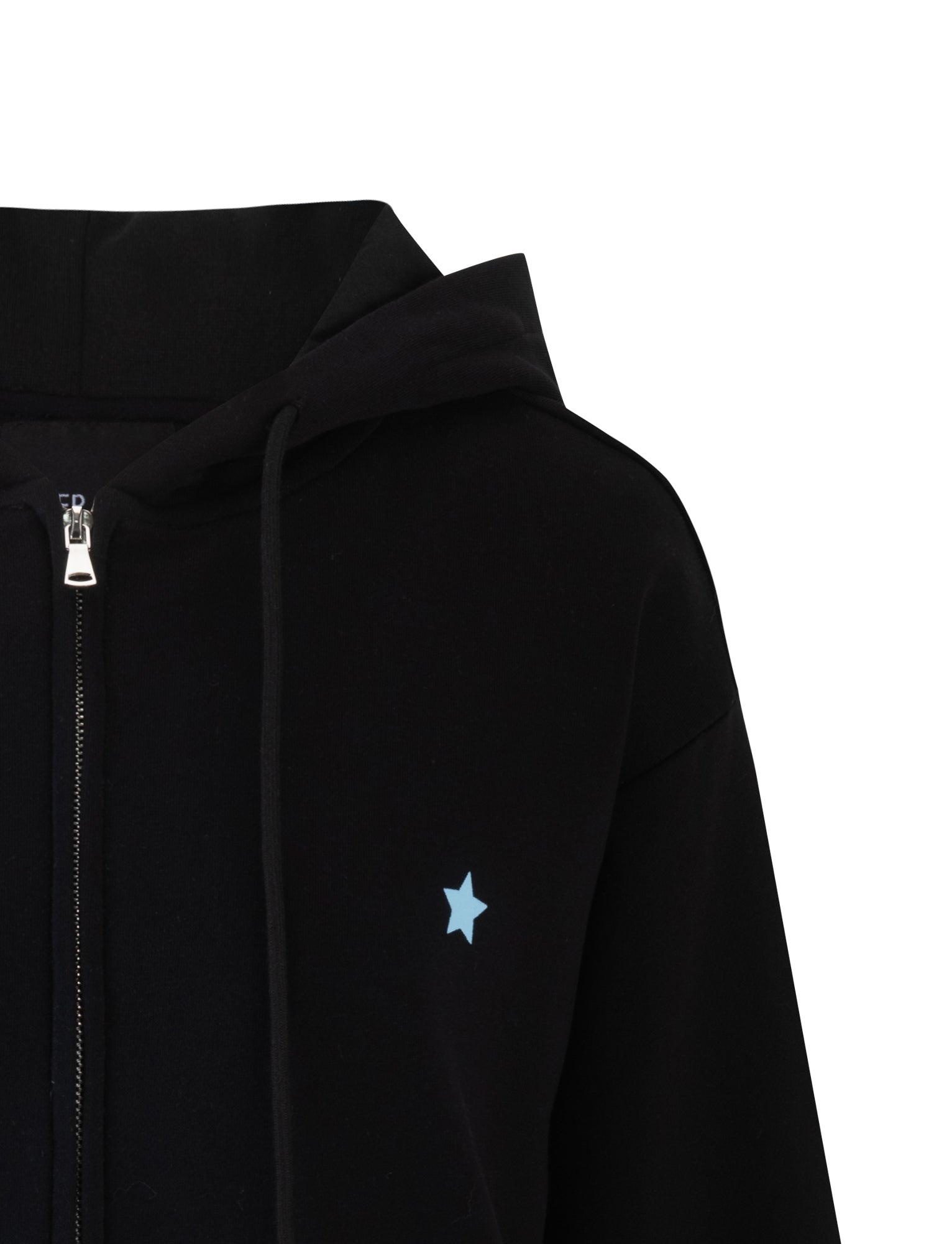 The ALISH HOODIE - BLACK by TIGERMIST is a black hoodie with a front zipper and drawstring for the hood. It features a small light-blue star design on the left chest area. The image highlights the upper part of the hoodie, clearly displaying the zipper, hood, and star detail.