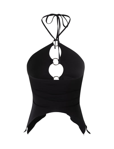 The TERI TOP - BLACK from TIGERMIST is a black halter top with a heart-shaped neckline and two circular metal rings at the chest. Its fitted design features asymmetric edges at the lower hem and straps that tie behind the neck, perfectly blending edgy and elegant styles.