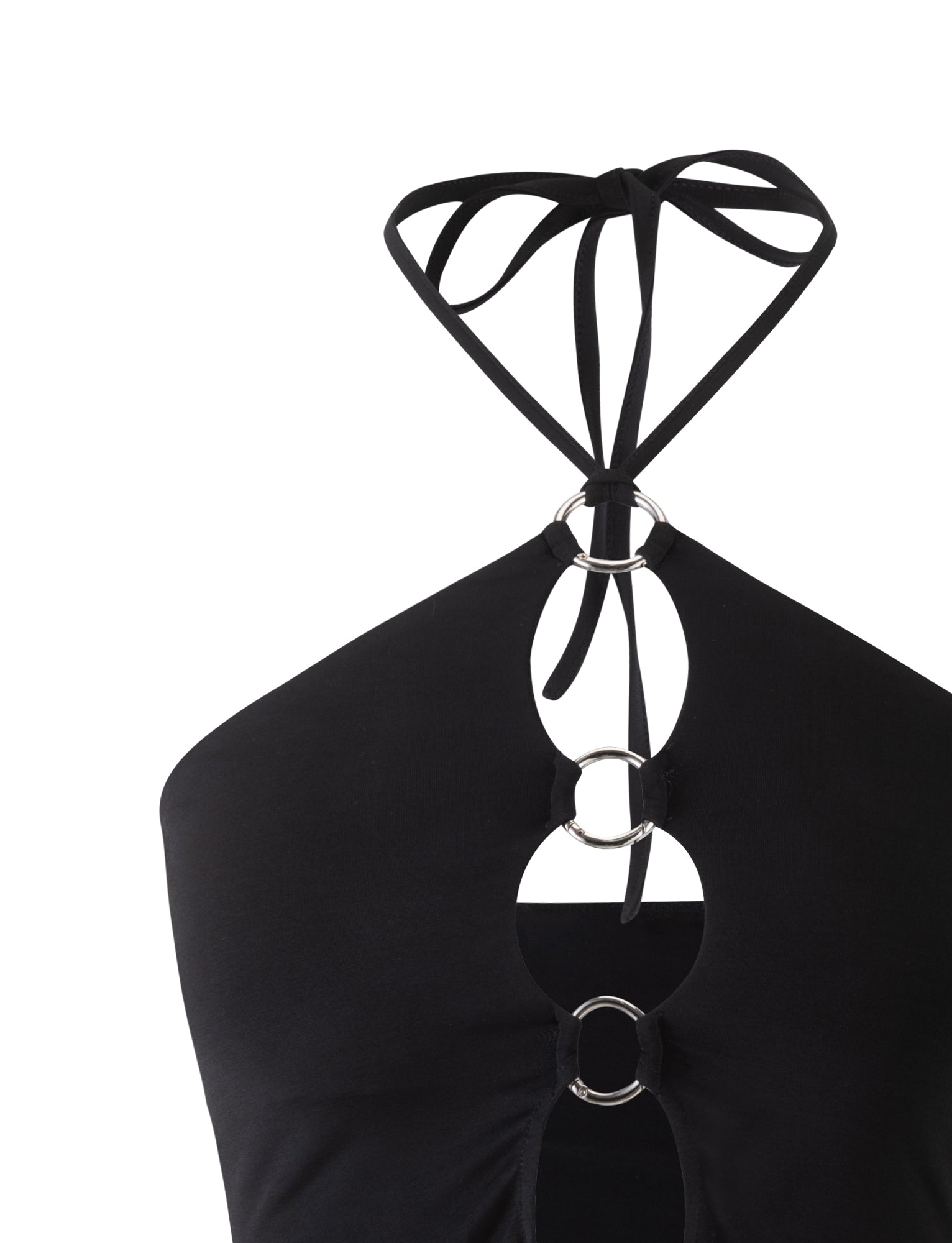 A close-up of the TERI TOP - BLACK by TIGERMIST, showcasing its intricate design with multiple metallic rings connecting the fabric along the neckline and chest area. The straps are tied at the neck, creating a chic and stylish look.