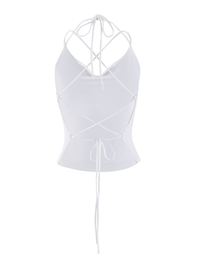 Introducing the ZAIDA TOP - WHITE from TIGERMIST, a stylish halter top featuring a fitted design and an intricate lace-up back. The crisscrossed strings tie at both the lower waist and neck, offering an open, adjustable fit. The smooth and stretchy fabric adds to its sophisticated look.