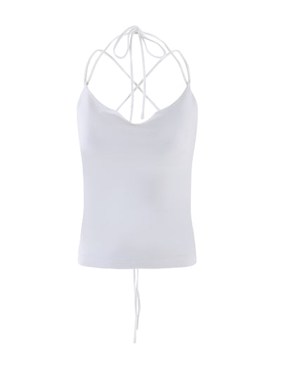 The ZAIDA TOP - WHITE from TIGERMIST is a white, sleeveless top featuring spaghetti straps with a crisscross design at the back and thin tie strings. The fabric appears smooth and slightly stretchy, giving it a fitted look.
