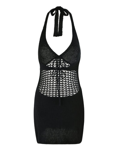 The DELTA MINI DRESS - BLACK by TIGERMIST showcases a halter neck with an adjustable tie closure at the back. This sleeveless knitted dress features a see-through crochet pattern around the bust and midsection, seamlessly transitioning to a solid knit from the waist down.