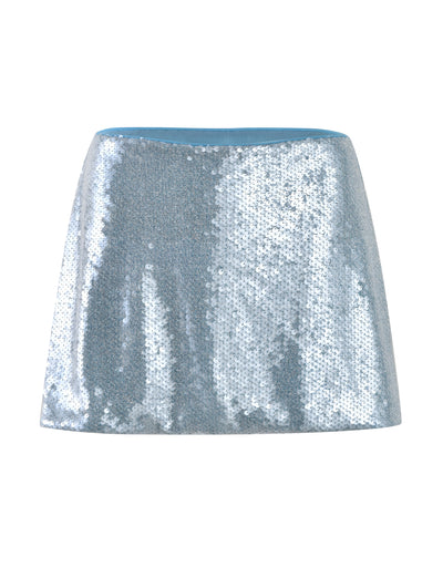 The Ilyana Skirt by Tiger Mist in Powder Blue features a slightly flared silhouette with a sparkling surface that catches the light for a glamorous effect. The design has no visible waistband, and it is showcased against a plain white background.