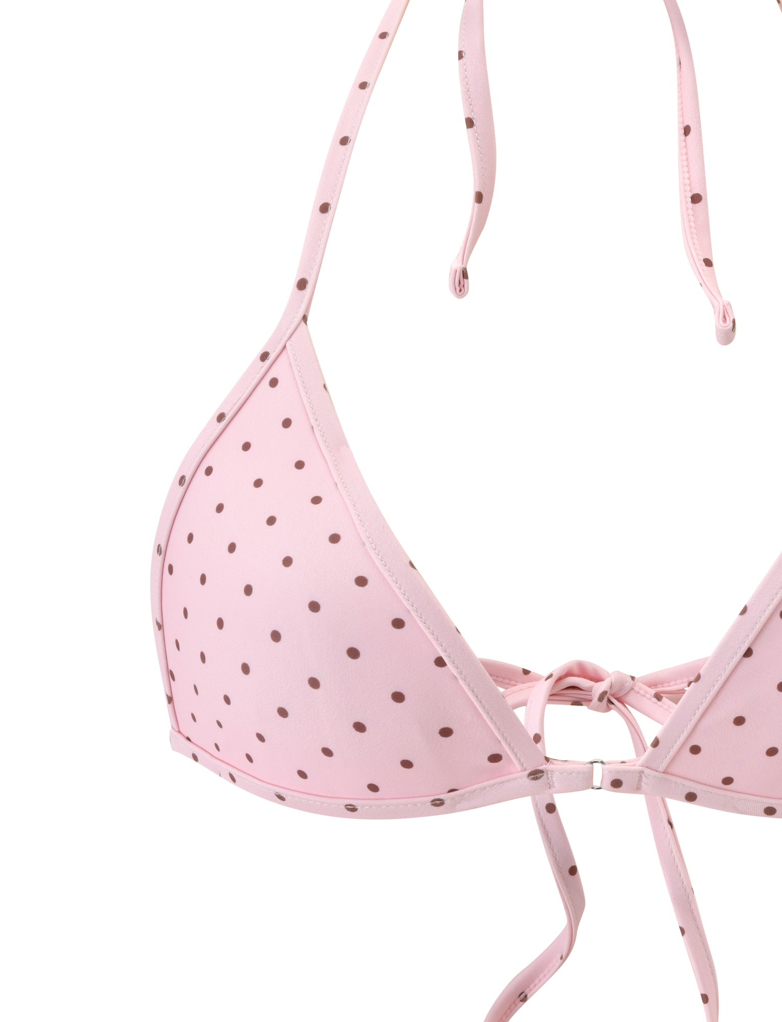 A close-up of the DIANA BIKINI TOP - PINK POLKA DOT by TIGERMIST, featuring adjustable neck and back straps, triangle bikini cups, polka dot print, and a cute bow detail at the center.