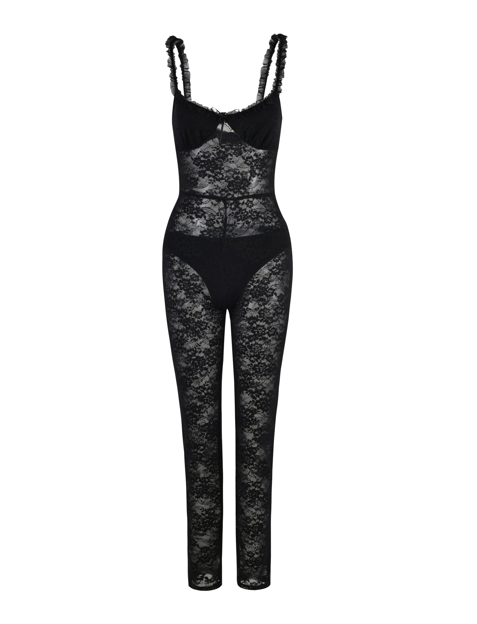 The DEJA JUMPSUIT - BLACK : LACE by TIGERMIST for women features a sleeveless design with a sheer floral lace pattern throughout, scalloped trim shoulder straps, and a cut-out detail at the bust. The jumpsuit also includes solid black panels covering the bust and hips for modesty.