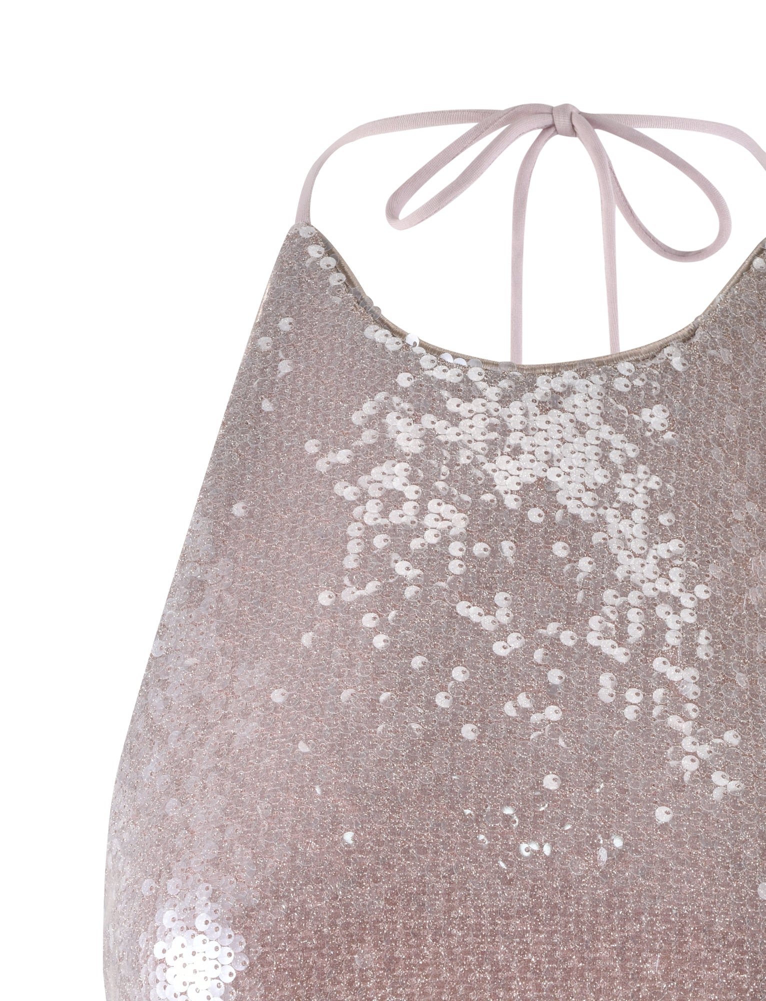 Close-up of a rose gold, sequined TIGERMIST ASTRAEA TOP. The shiny sequins create a sparkling effect across the fabric, catching the light. The top is held up by thin straps that tie around the neck.