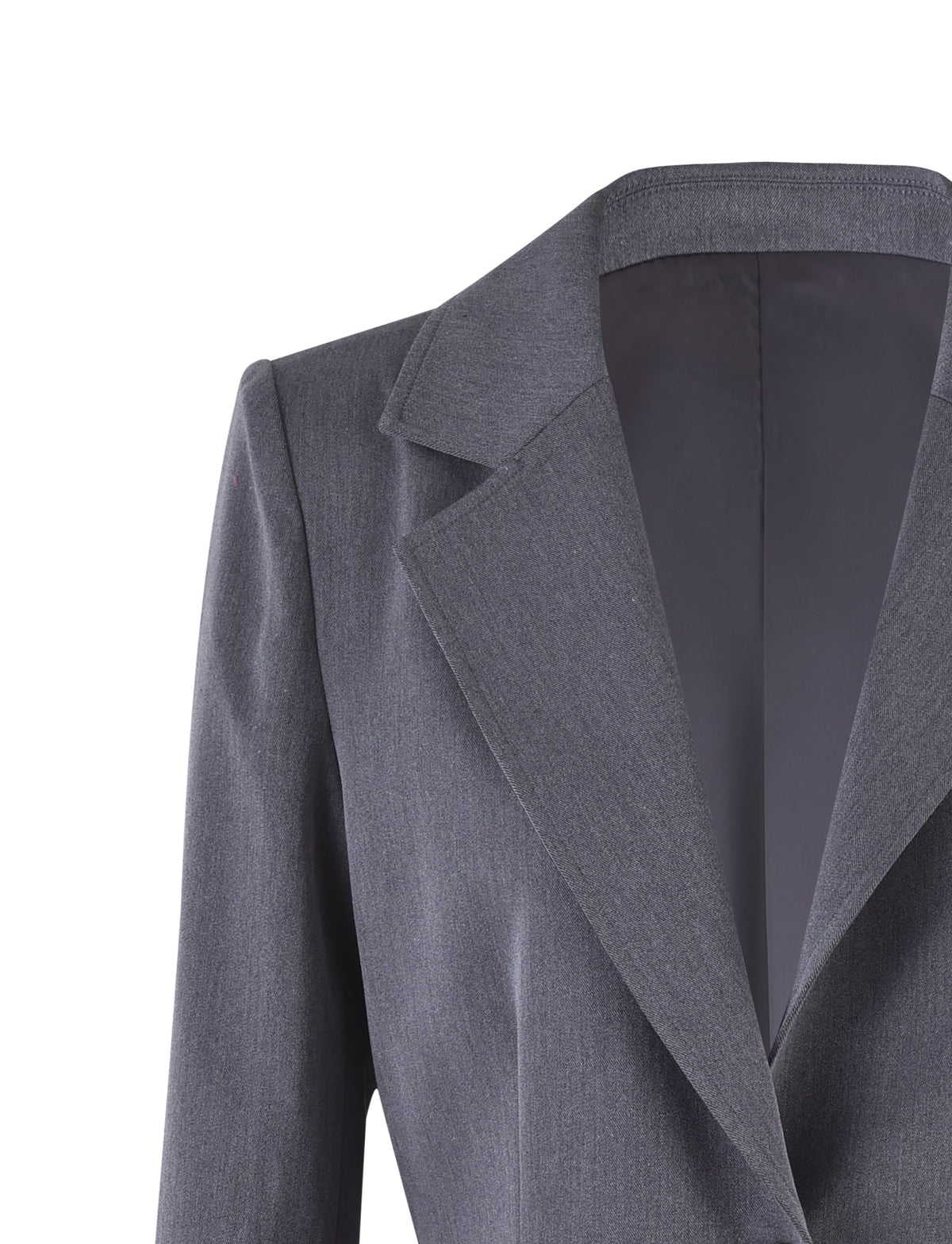 Close-up of the NADINE JACKET - GREY : SLATE by TIGERMIST with a notched lapel and structured shoulders. The jacket appears to be made of a smooth fabric and features a minimalist design with clean lines. The plain white background accentuates the jacket's color and texture.