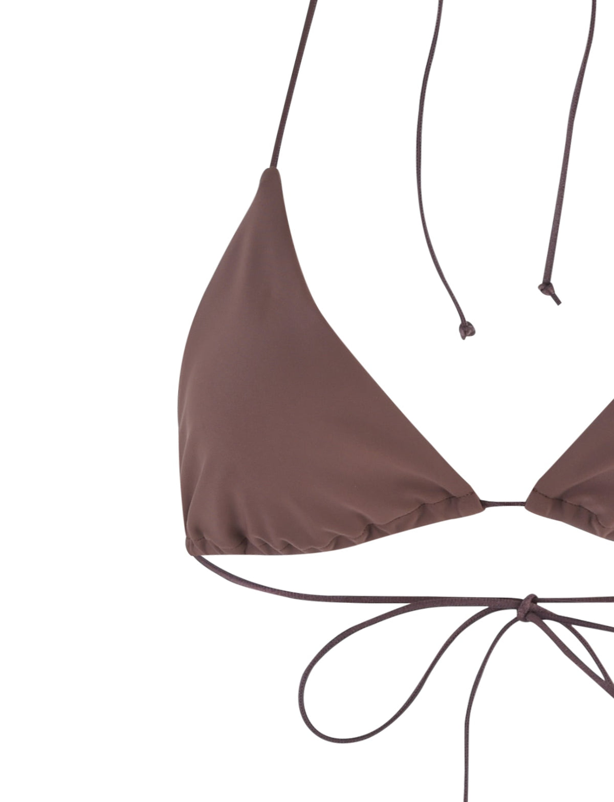 A close-up of the TIGERMIST KRYZE BIKINI TOP - BROWN : CHOCOLATE, featuring thin straps that tie at the back and around the neck, with the ends hanging loosely. The material appears smooth and slightly shiny, emphasizing a minimalist design.