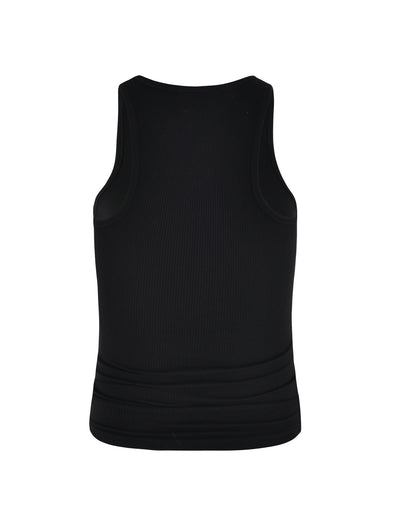 The SOMMER TANK - BLACK from TIGERMIST is displayed, photographed from the back. This black sleeveless tank top has a ribbed texture and a snug fit with a simple, unadorned design.
